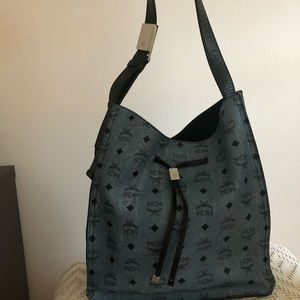MCM shoulder handbag in light blue color.
